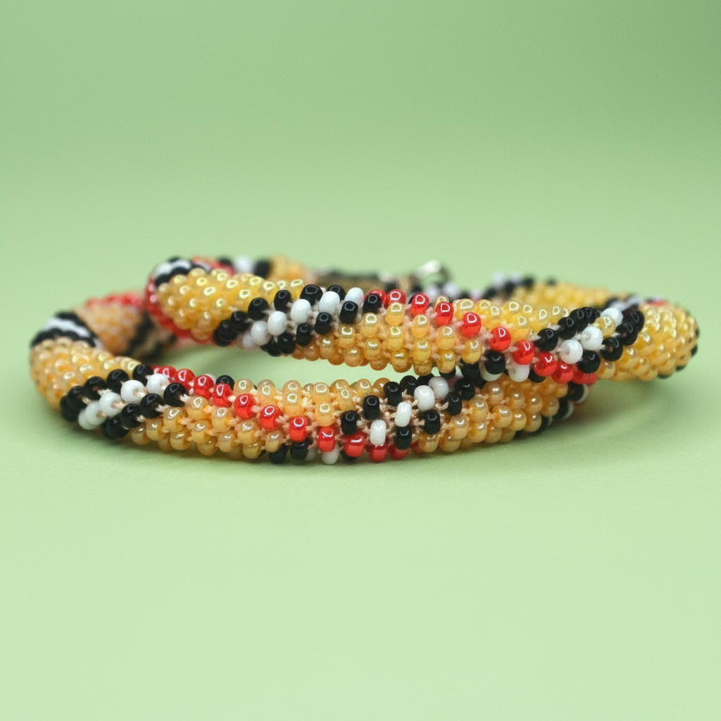 Beaded hoop earrings with multicolor pattern on a green background - Beadzy