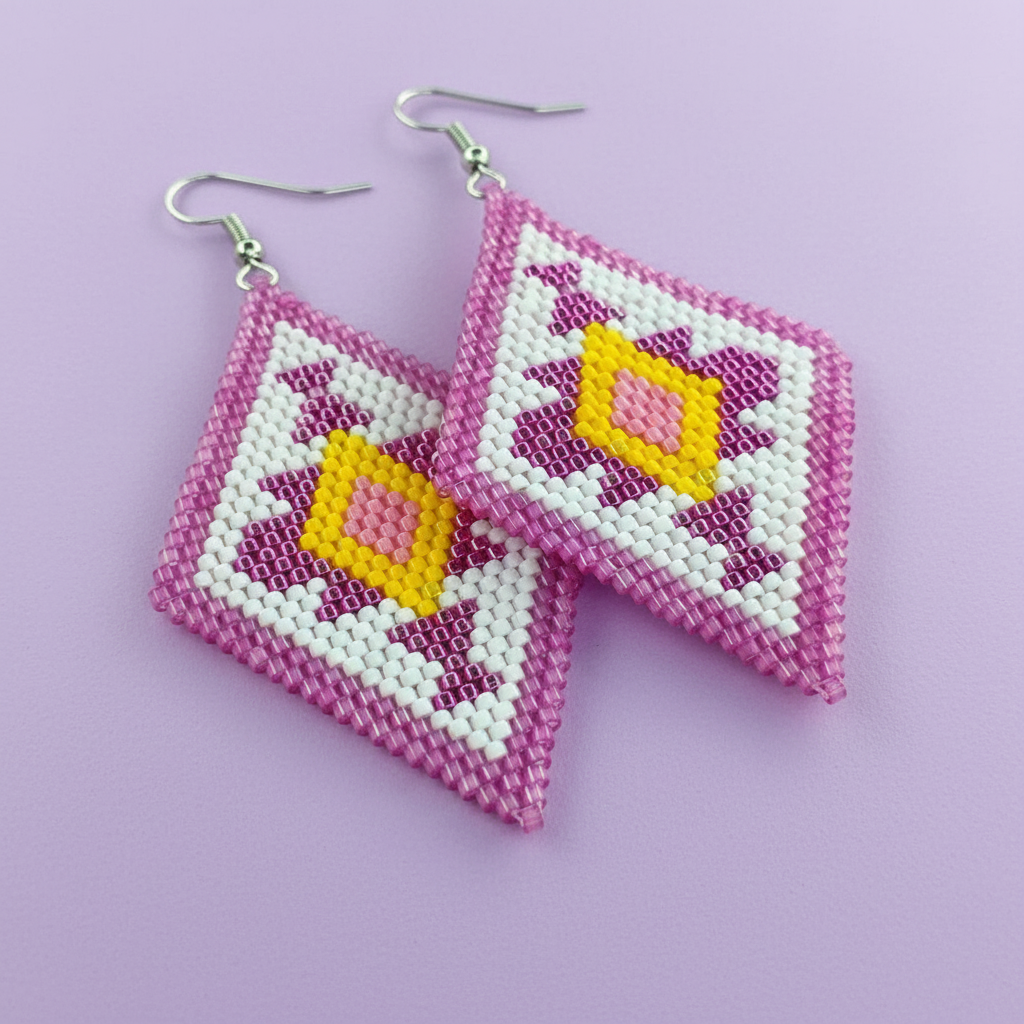 Beaded earrings with pink, yellow, and white pattern on a purple background - Beadzy