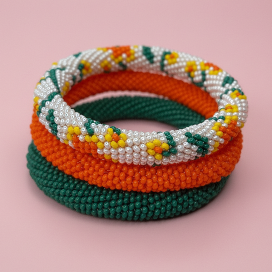 Set of colorful beaded hair ties on a pink background -Beadzy