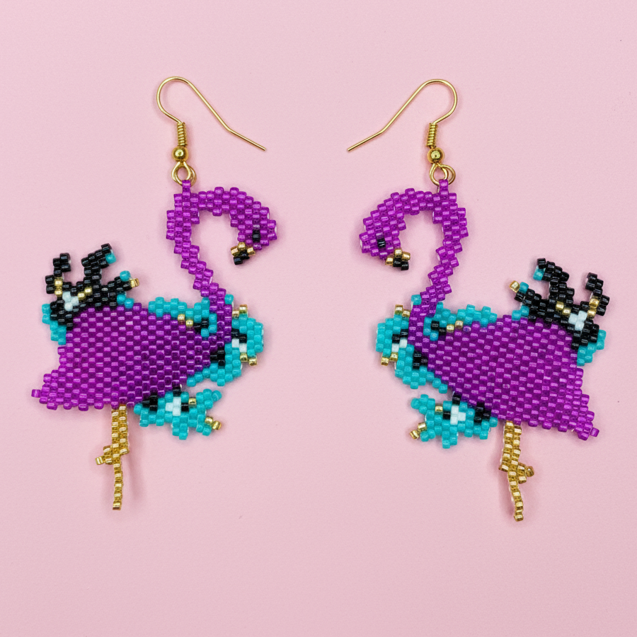 Beaded purple flamingo earrings on a pink background - Beadzy