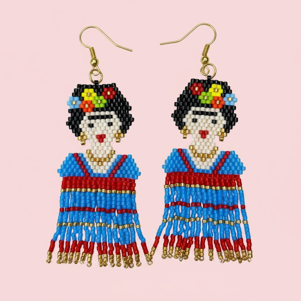 Beaded earrings of a Frida figure with a colorful headpiece on a pink background - Beadzy