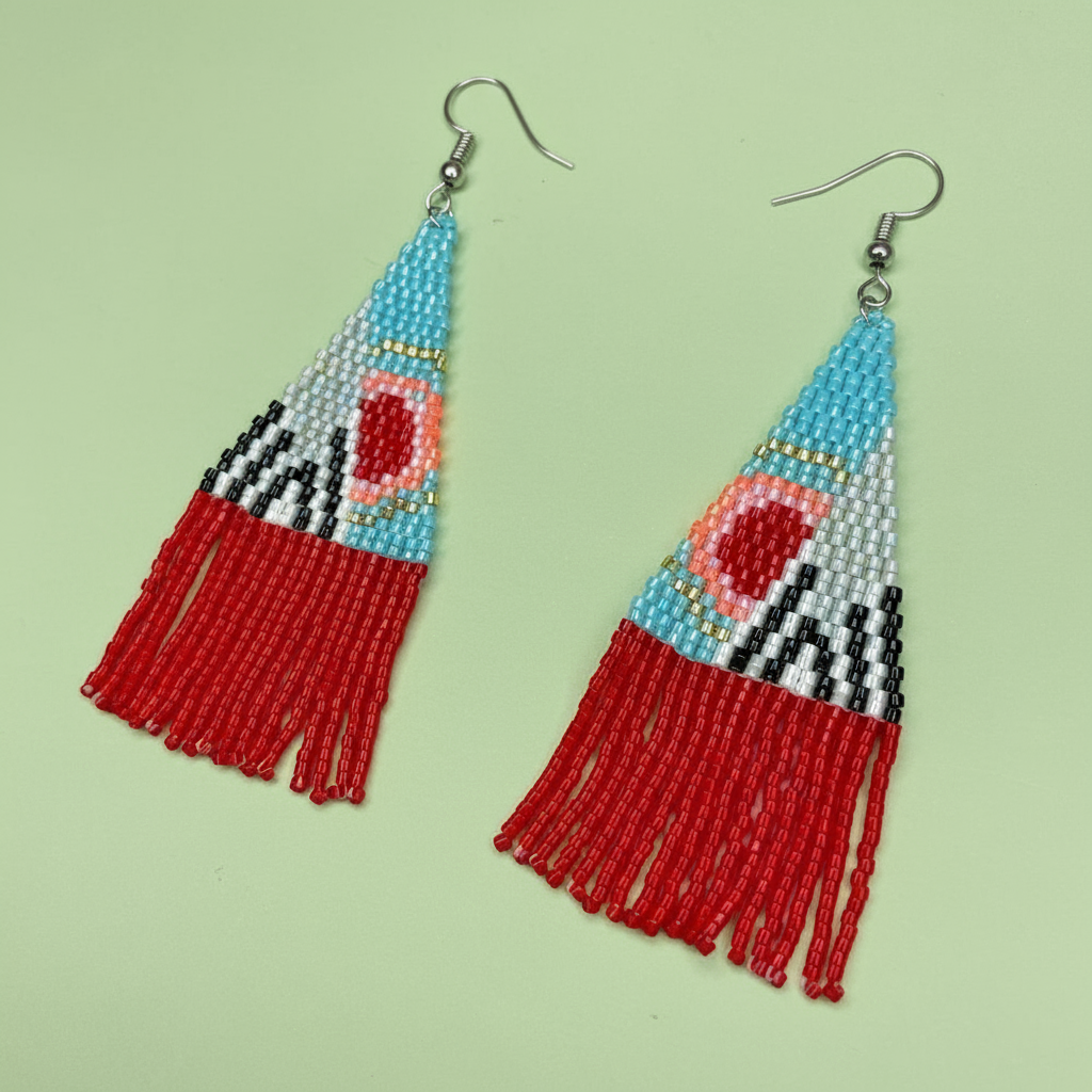 Beaded earrings with red and blue design on a light green background - Beadzy