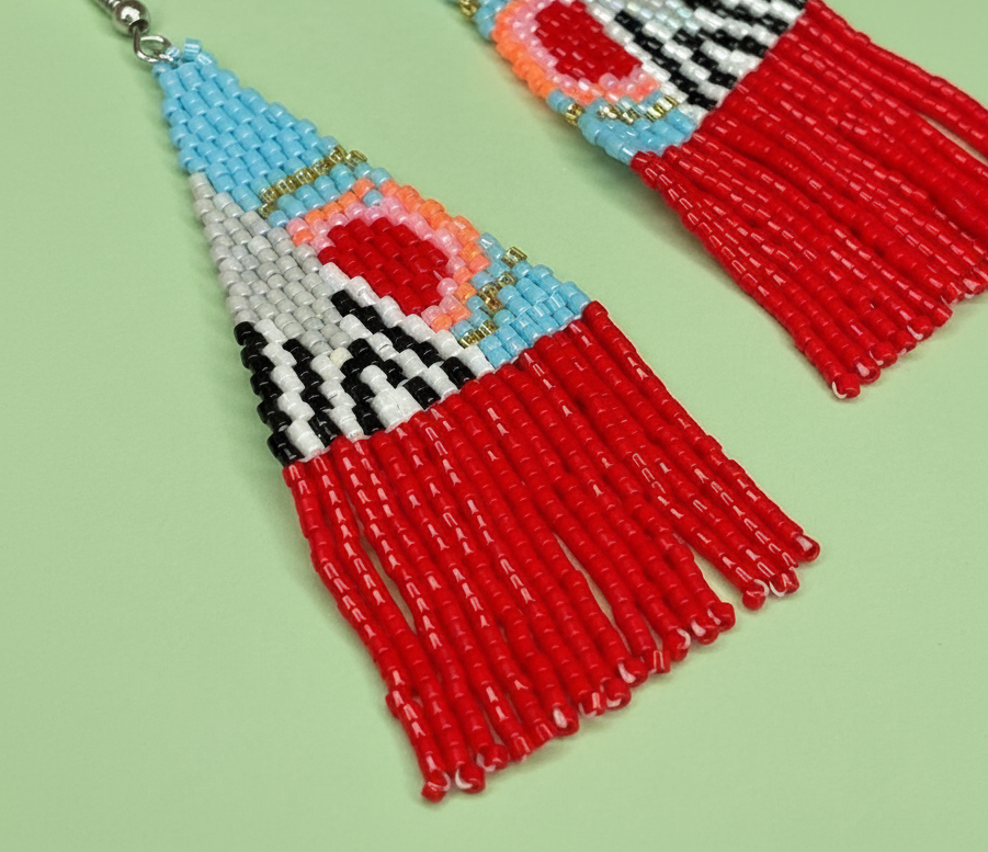 Beaded earrings with geometric pattern on a light green background - Beadzy