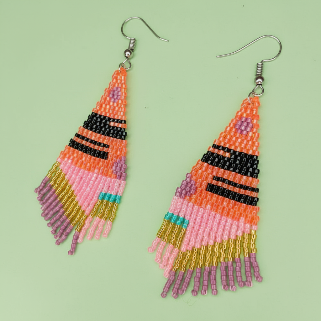 Colorful beaded earrings on a light green background - Beadzy