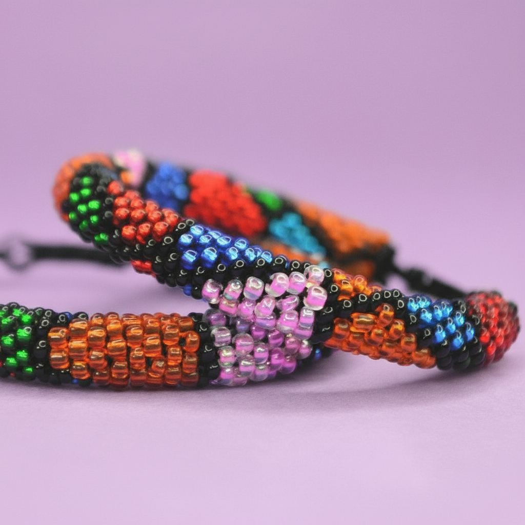 Colorful beaded bracelet on a light purple background - Beadzy