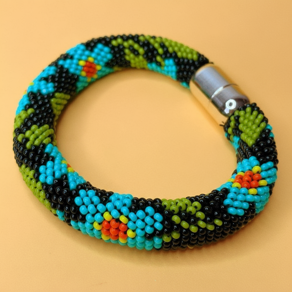 Colorful beaded bracelet on a beige background - Beadzy