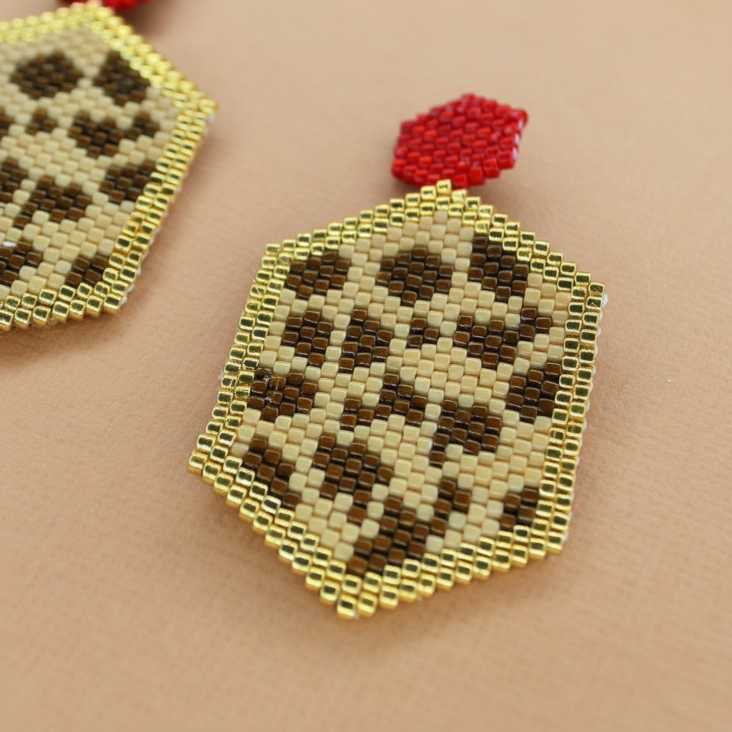 Hexagonal beaded earrings with a leopard print pattern on a beige background - Beadzy