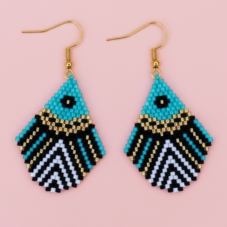Pair of beaded earrings with geometric pattern on a pink background - Beadzy