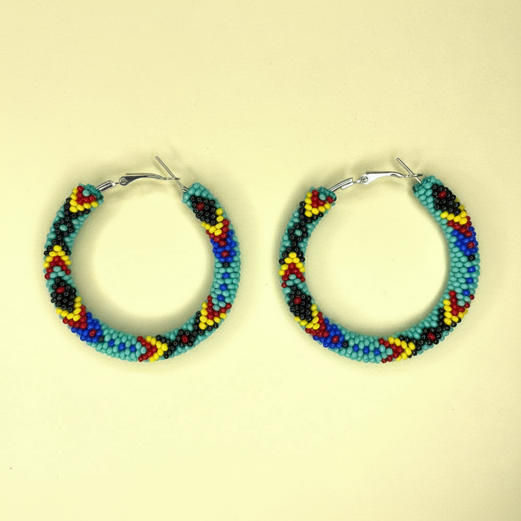 Colorful beaded hoop earrings on a beige background - Beadzy