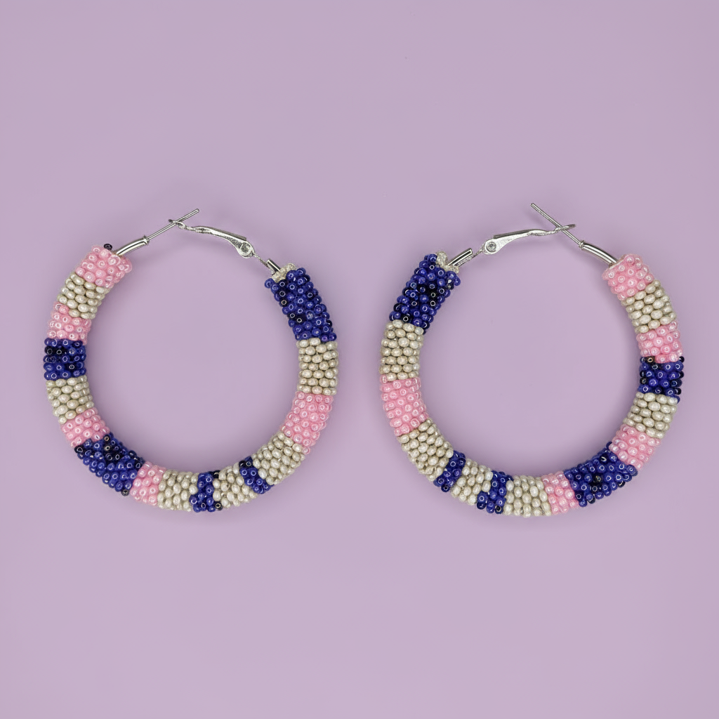 Hoop earrings with multicolored bead design on a purple background - Beadzy