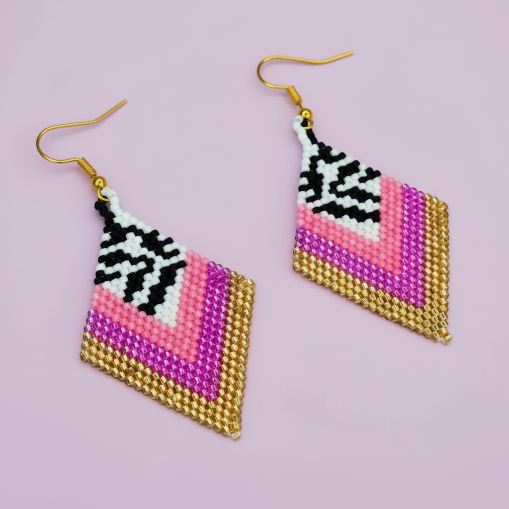 Geometric patterned earrings on a light purple background - Beadzy
