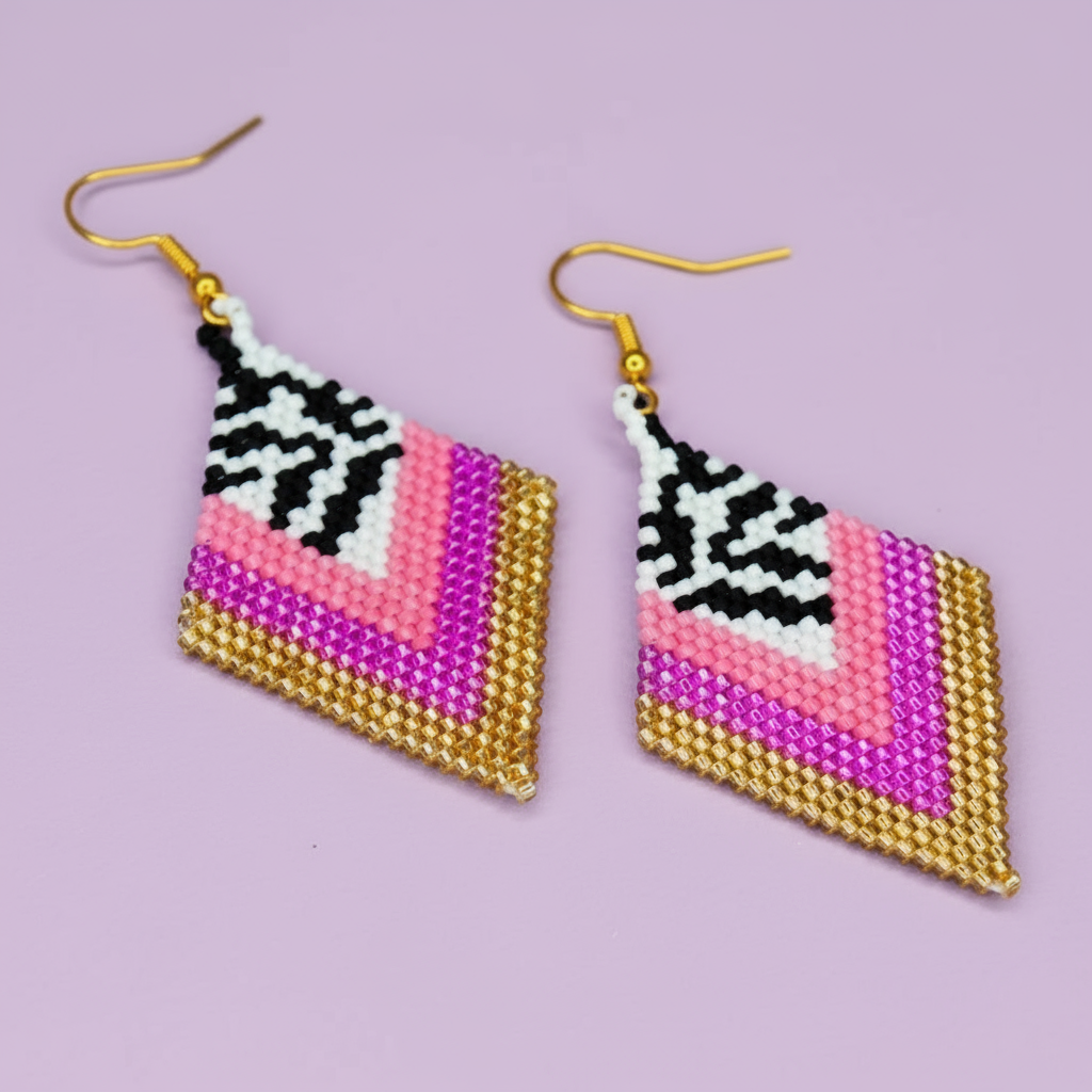 Geometric patterned earrings on a light purple background - Beadzy