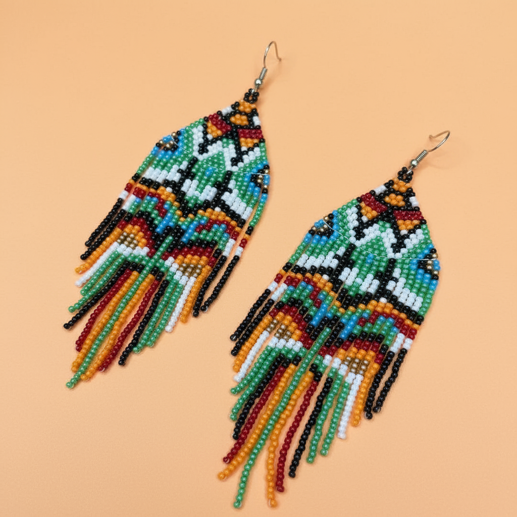 Colorful tassel beaded earrings on a beige background - Beadzy
