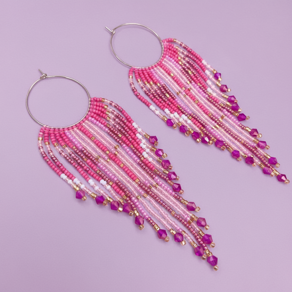 Pink beaded earrings on a purple background - Beadzy