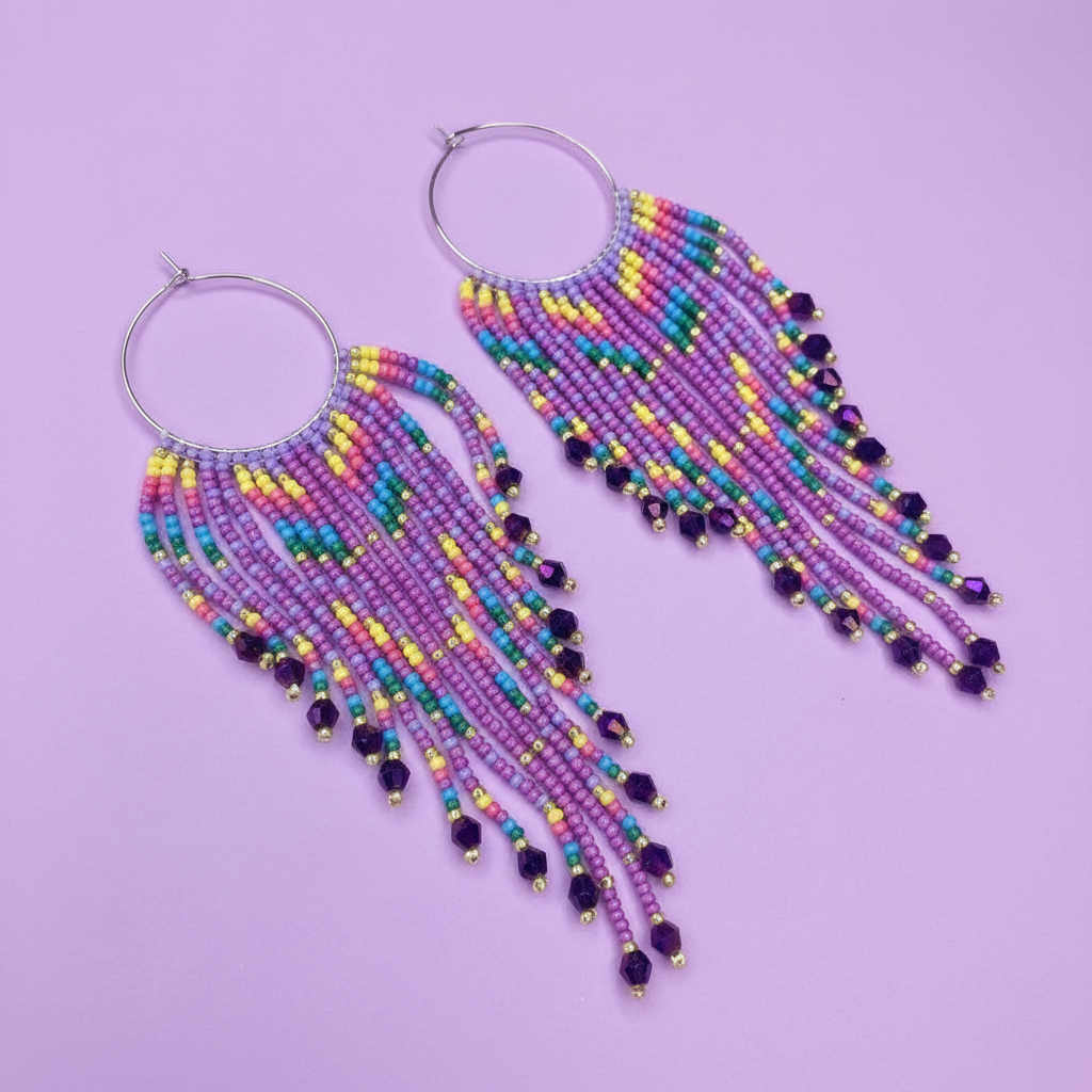 Colorful beaded hoop earrings on a purple background - Beadzy