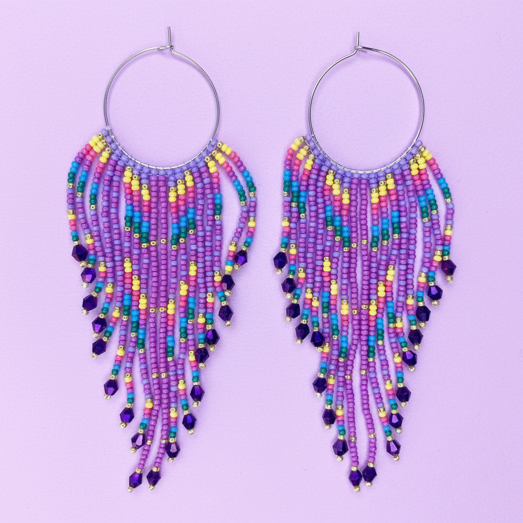Colorful beaded earrings on a purple background - Beadzy