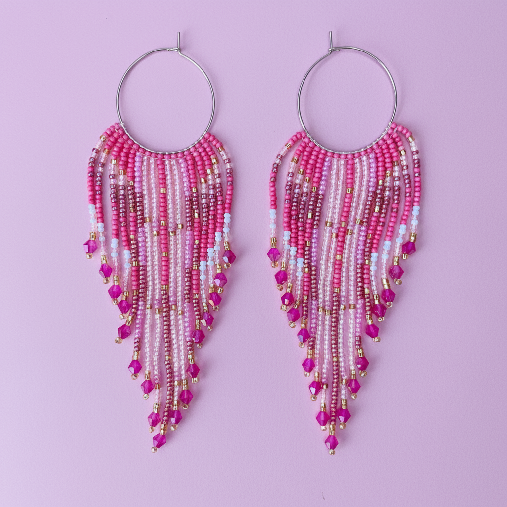 Beaded earrings with pink and gold beads on a purple background - Beadzy
