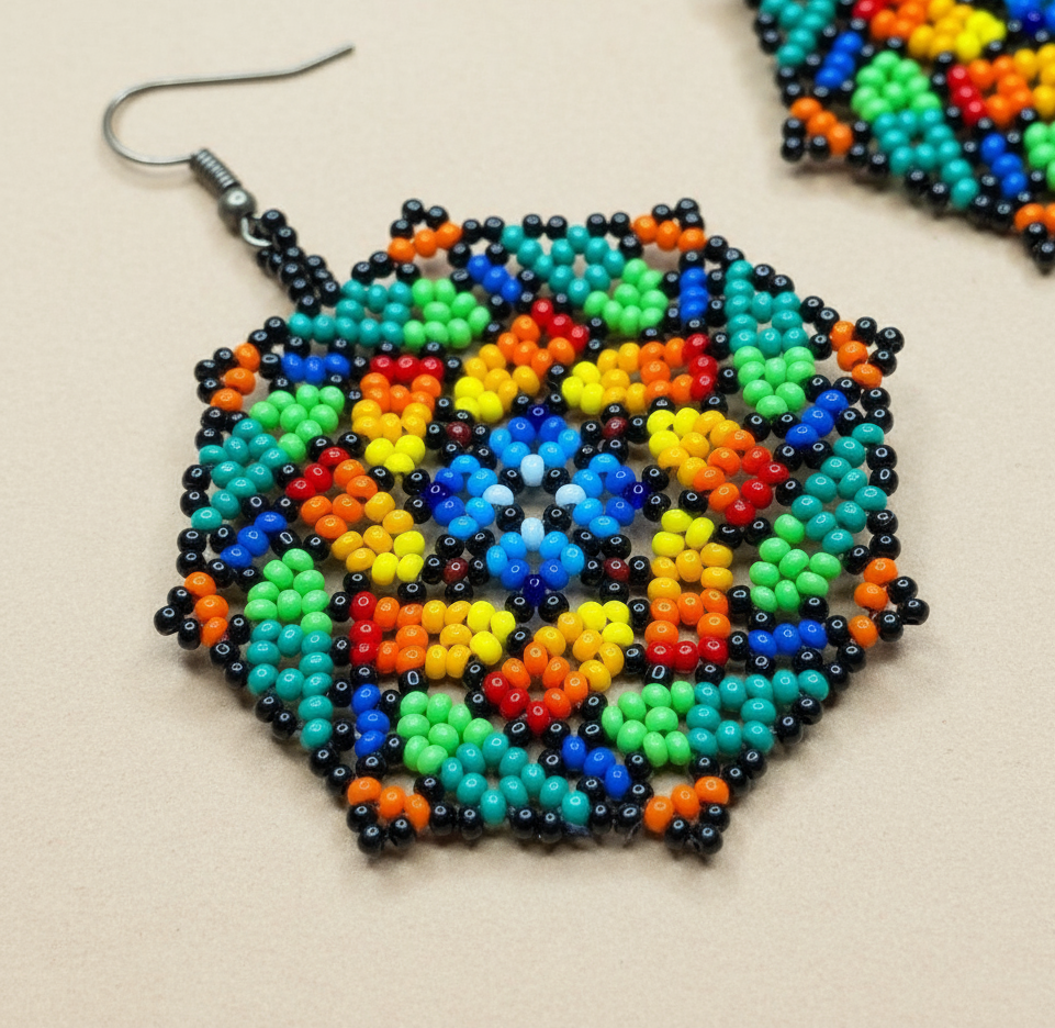 Colorful beaded earrings on a beige background - Beadzy