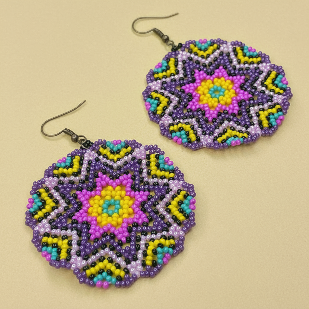 Colorful beaded earrings on a beige background - Beadzy