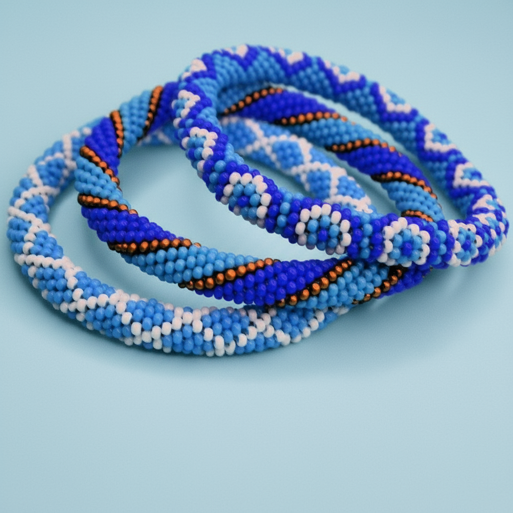 Blue beaded rope bracelets on a light blue background - Beadzy